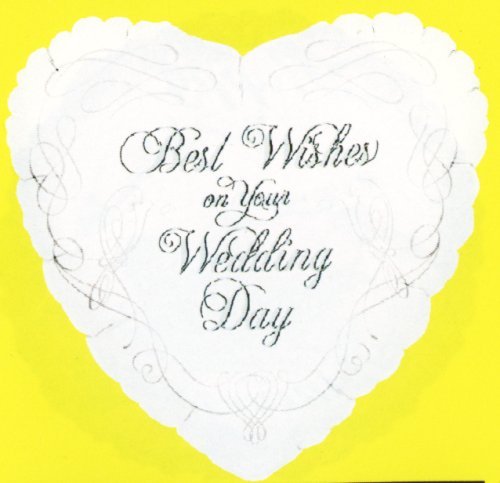 A white heartshaped balloon with wedding wishes and intricate designs of